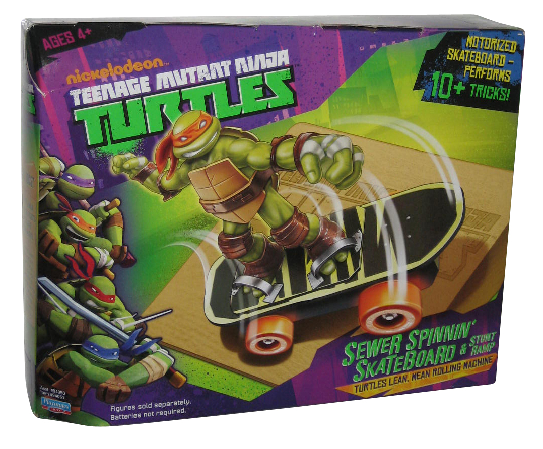 ninja turtle toy on skateboard